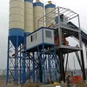What kind of mixer is used in a dry batching plant?